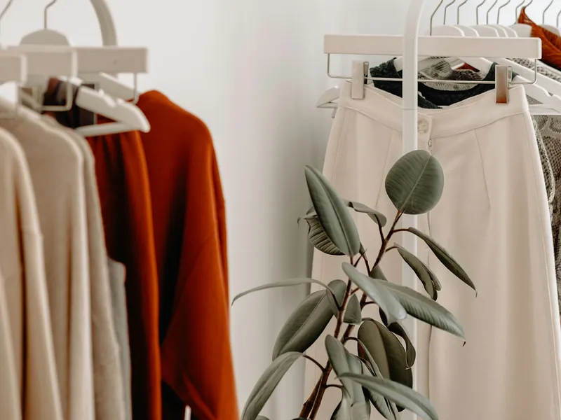 Garments on a boutique rail used as an illustrative online-store product photo